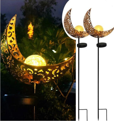 LED solar flame light with metal frame, warm white LED, flame effect, waterproof for outdoor use in gardens and landscapes.